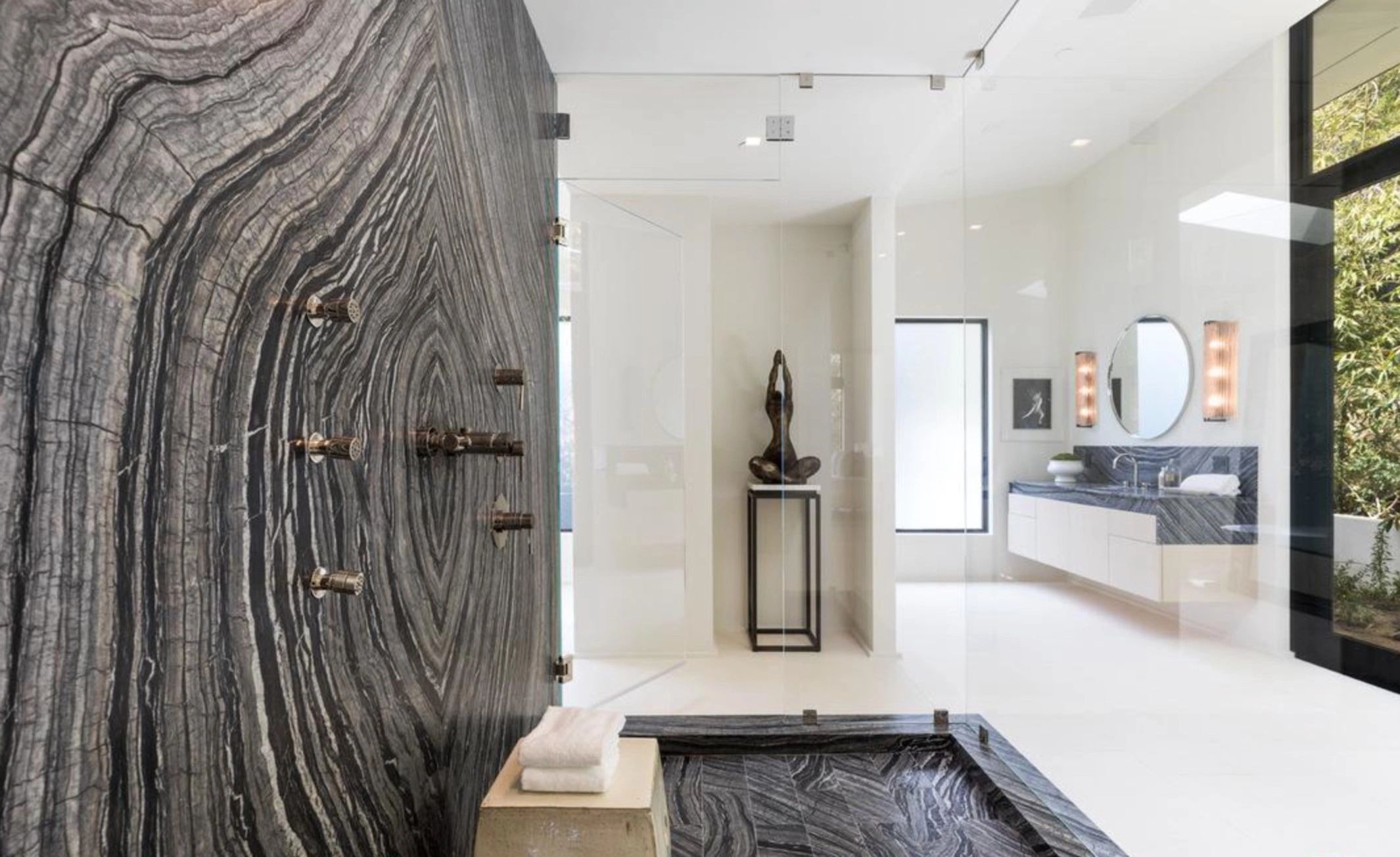 Modern Bathroom with book matched silver wave marble slabs