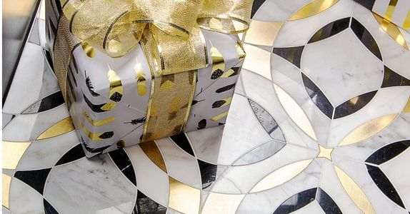 Custom Waterjet pattern made from Marble in Los Angeles at Royal Stone & Tile -  brass and marble