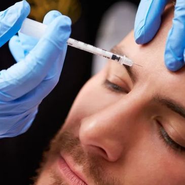 Botox in a male client to decrease frown lines.