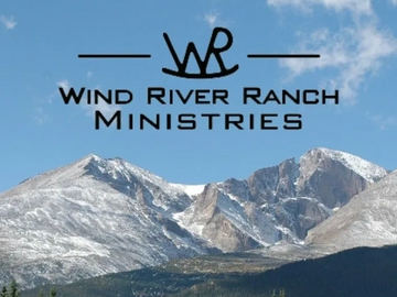 Logo of Wind River Ranch Ministries with mountain backdrop.