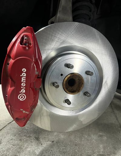 New OEM front brake rotor