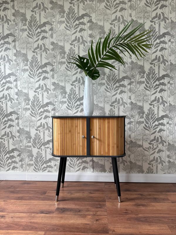 Small cabinet with vase