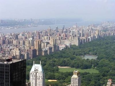 Aerial view of Central Park surrounded by New York City buildings.