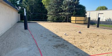 A photo of the new sand volleyball court.