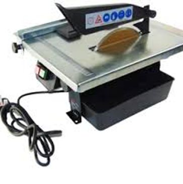 Electric tile cutter with safety guard and water tray attachment.