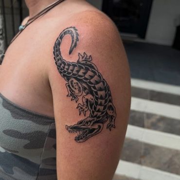Black gator tattoo done in Pensacola fl NAS 