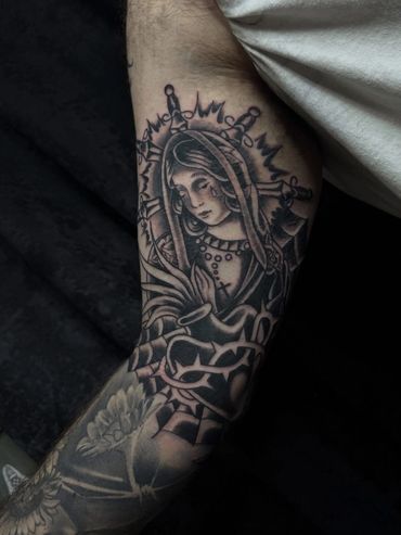Black and grey traditional flash tattoo done in Pensacola , Fl 
