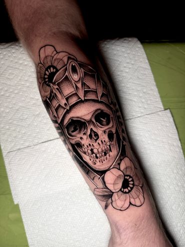 Blackwork skull flash tattoo done by Robert Smith in Pensacola Fl at fates tattoo 