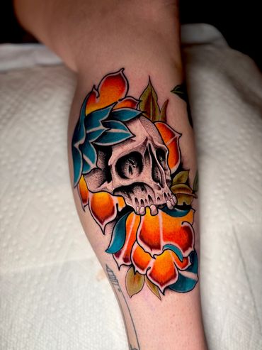 Skull flower flash tattoo done by Robert Smith in Pensacola , Fl at fates tattoo 