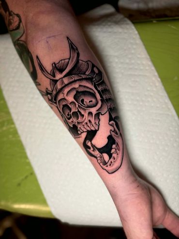 Blackwork samurai skull flash tattoo done by Robert Smith in Pensacola Fl at fates tattoo 