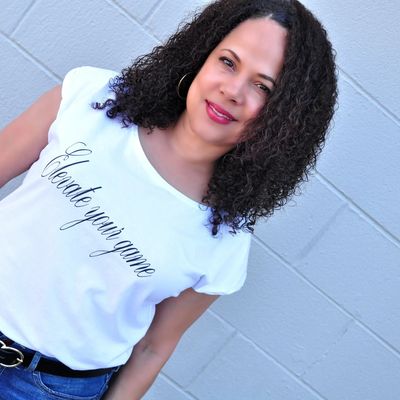 Casual image of Malika Lorie wearing a Elevate your game t-shirt!