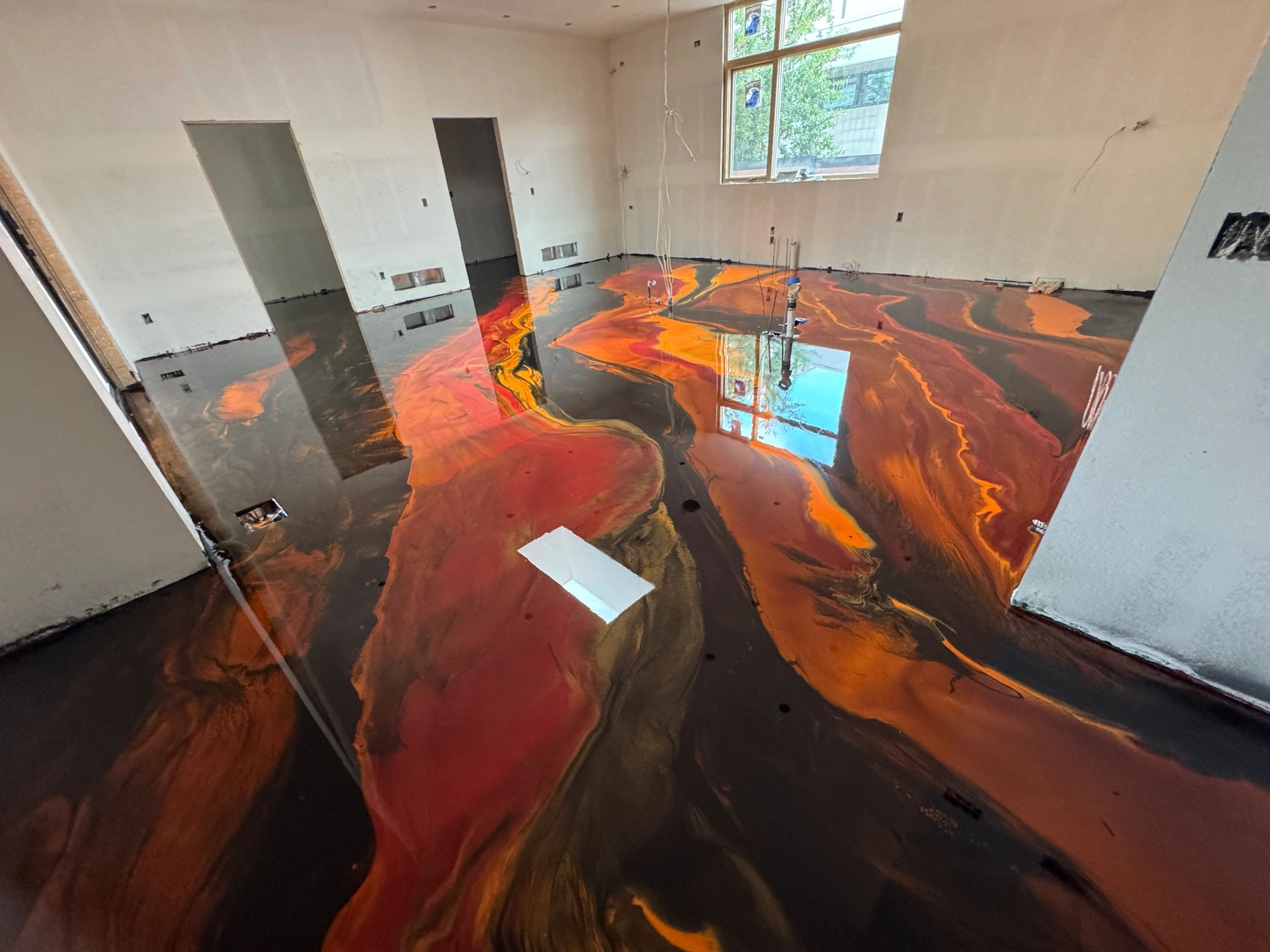 Professionally Installed Metallic Epoxy floor. 