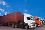Containerised cargo transport by trailer