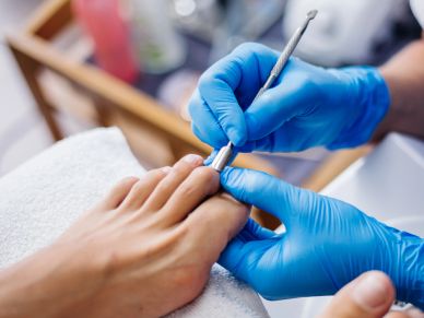 Manicure with blue gloves.