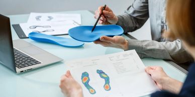 Custom orthotics assessment and digital foot analysis at Ocean Foot Care