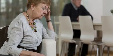 Women with her head down upset.
