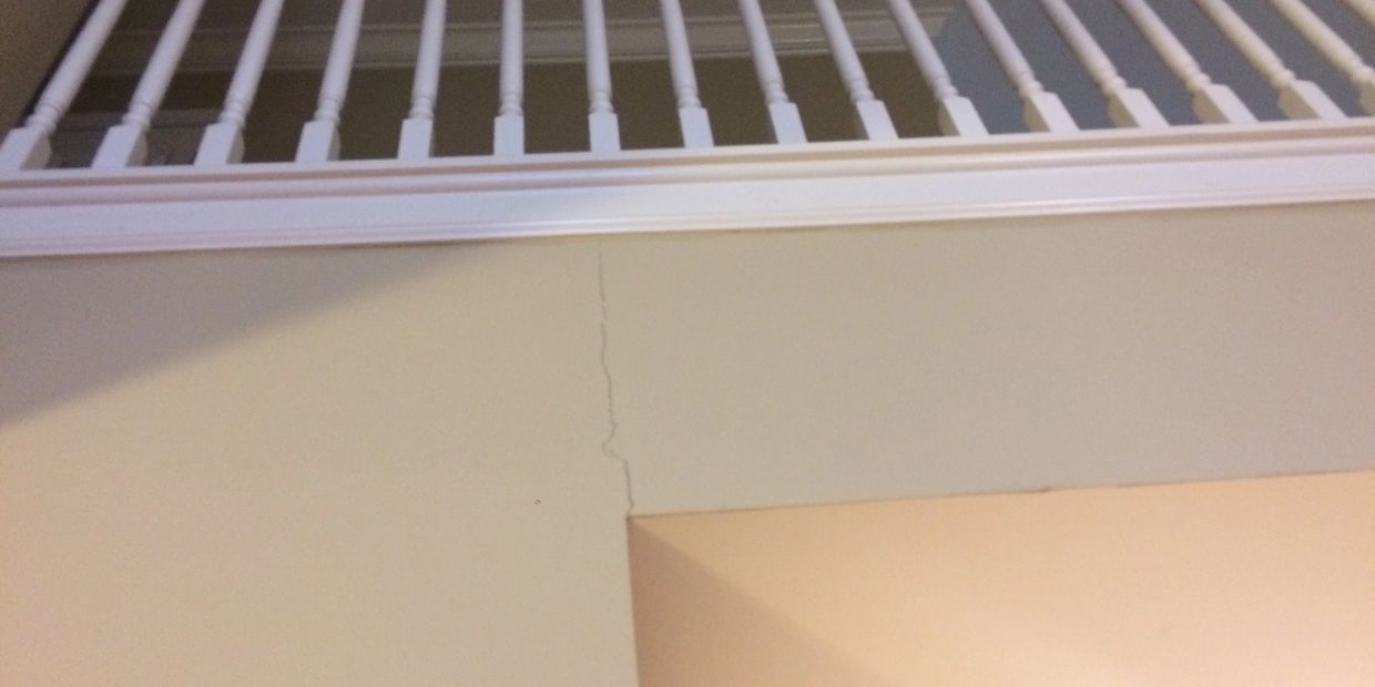 Drywall crack over opening