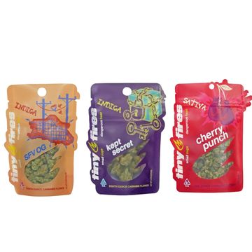 Three colorful My Fires cannabis packaging bags with different strains.