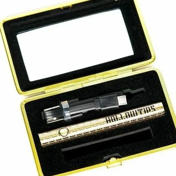 Luxury gold-colored vape pen set in a black velvet-lined case.