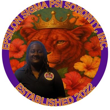 Woman in front of a colorful lion emblem with crown and text.