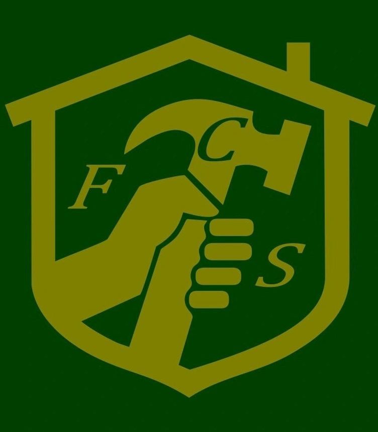  Graphic logo of a House shaped shield outlining a hand grasping a hammer with the initials F,C,S