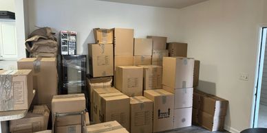 Boxes packed for the move.