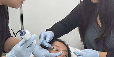 Image of face microneedling with salmon sperm at Mujtaba Clinic for skin rejuvenation.