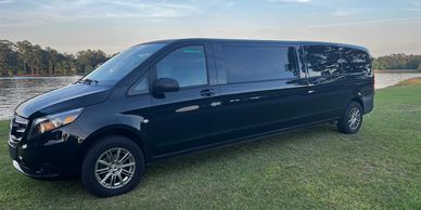 BarNew Luxury Transportation Mercedes Metris Limousine Van by the lake.