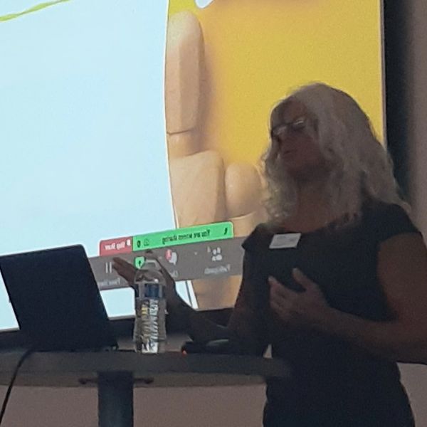 Woman presenting a PowerPoint