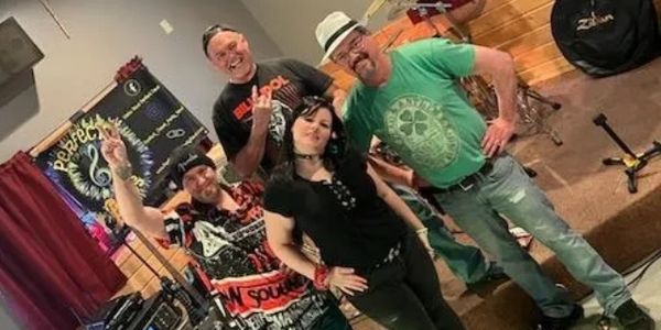 Perfect Chaos in a group picture tilted to the left. 