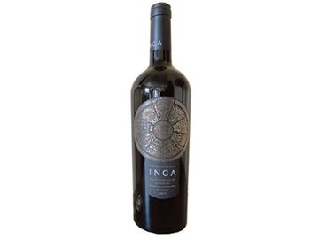 Bottle of Inca wine with an intricate circular label design.