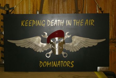 Custom Signs such as this one for a military unit are fabricated at Rapid Creek Cutters.