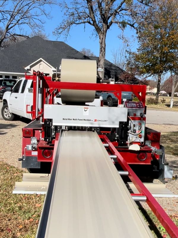 Standing seam metal roof panel on site roll forming