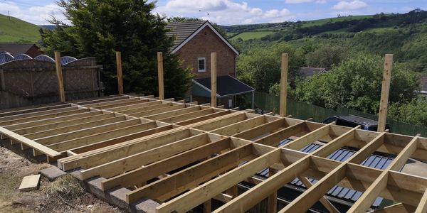 Wooden framework for outdoor decking under construction.