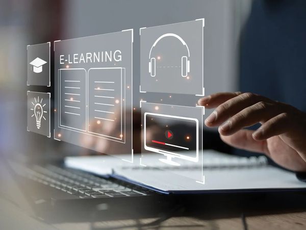 Hand with E-Learning concept