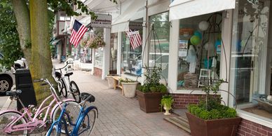 Bikes parked in front of stores