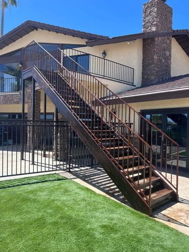 Stairs with handrail.  The handrail has decorative knuckles. Henderson, Boulder City, Lake Las Vegas