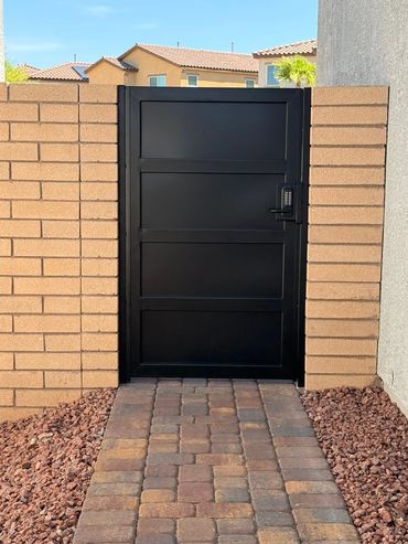 Horizontal wrought iron gate with solid backing for maximum privacy #henderson #lasvegas 