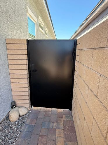 Horizontal wrought iron gate with solid backing for maximum privacy #henderson #lasvegas 