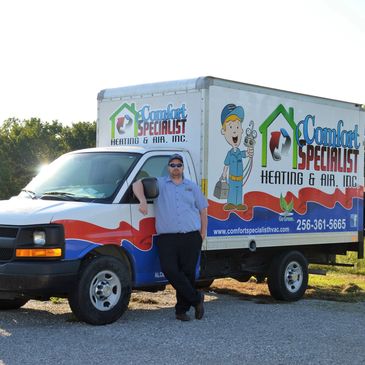 Owner Cain Fralix with service truck, going to perform local hvac heating and cooling repairs