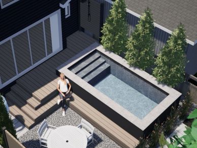 Small modern backyard pool next to a deck and seating area.