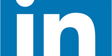 Close-up of the LinkedIn logo with blue background.