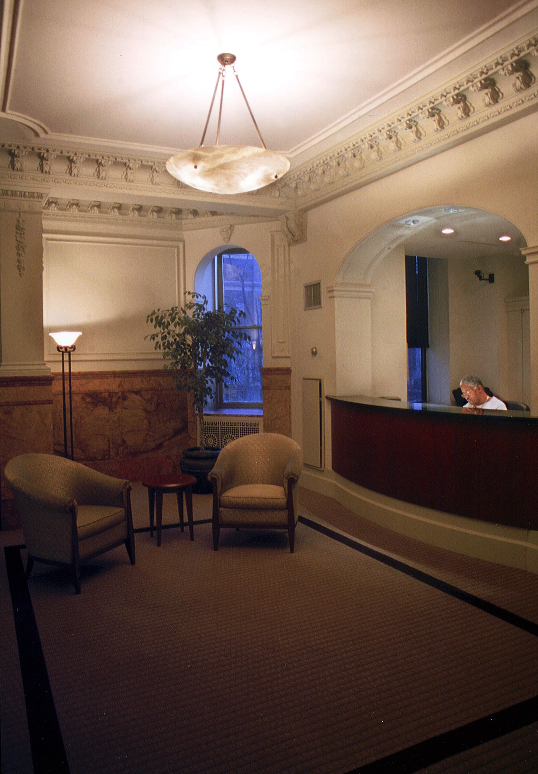 Restored entrance lobby; plaster mouldings; Spanish alabaster luminaire; restored marble.