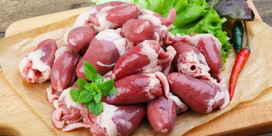 Chicken heart on meat platter. 