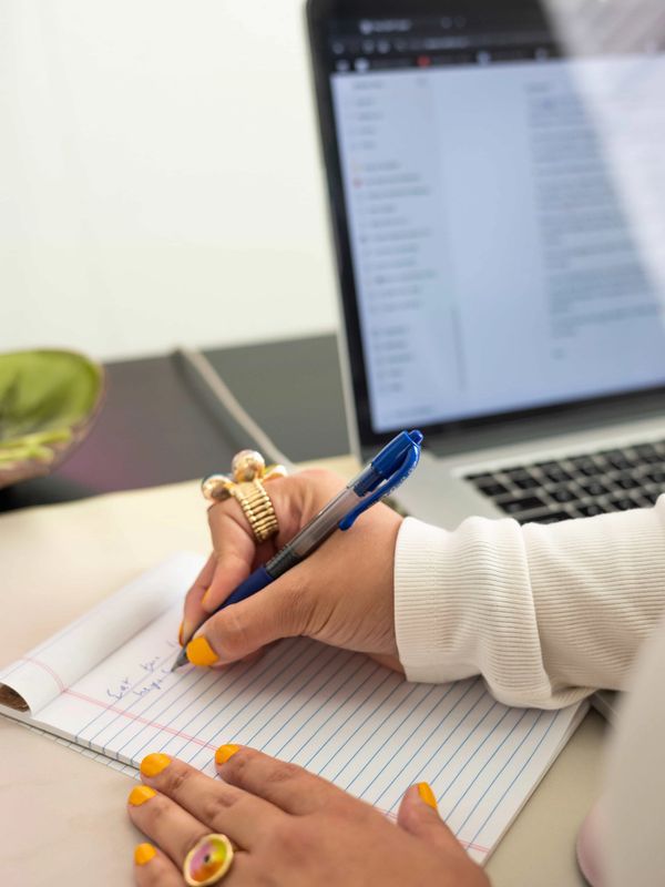 Kelsey writing notes.