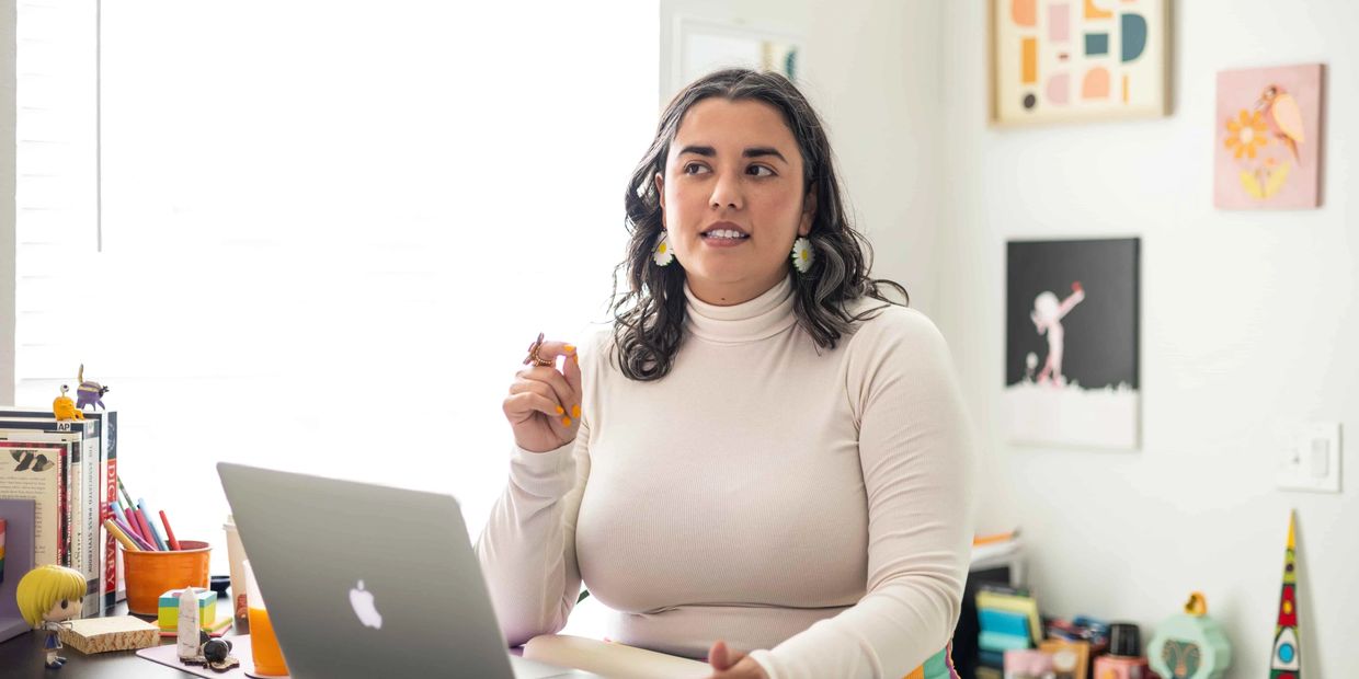 Kelsey working at home office.