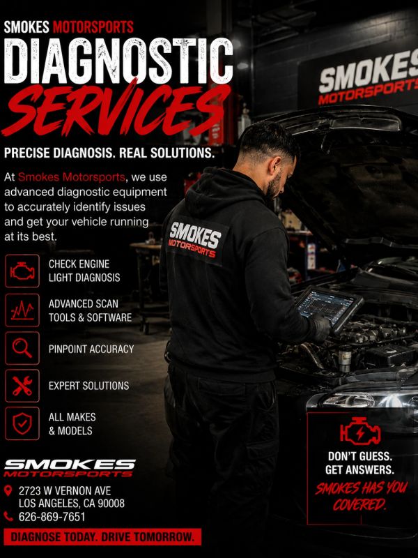 Technician diagnosing a car using advanced tools at Smokes Motorsports.
