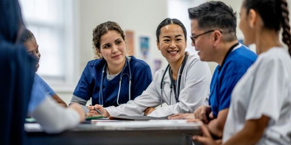 Doctors having a discussion in a meeting.