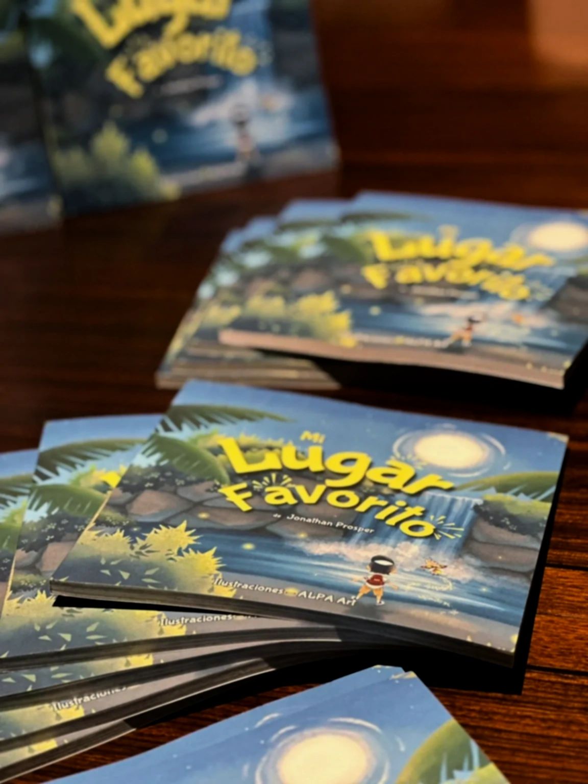 Libros infantiles titulados "Mi Lugar Favorito" apilados.