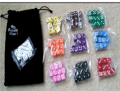 Multiple colorful dice sets and a Family Glue dice bag on a carpet.